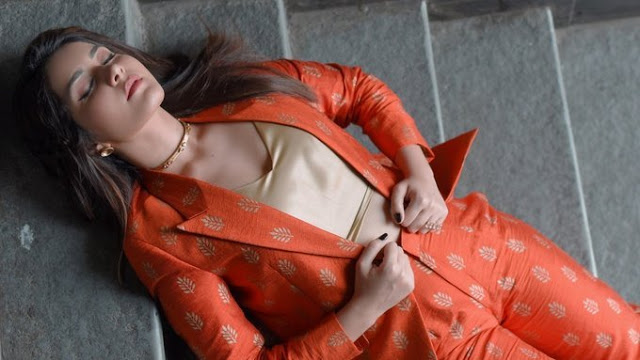 Raashi Khanna latest Photo Shoot In Long Hair Orange Dress 8